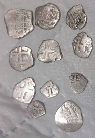 Monedas y rastro de tesoro